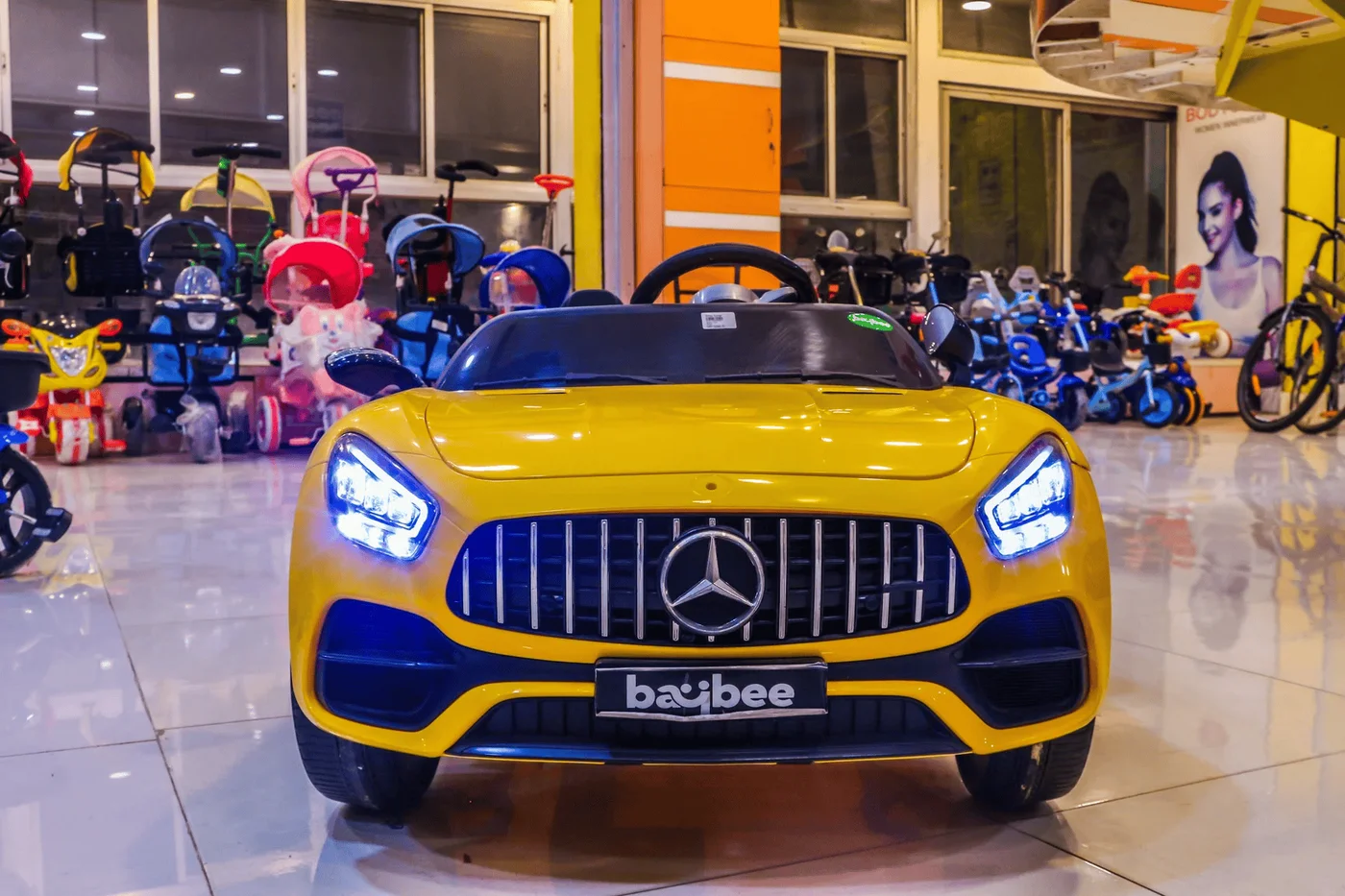 Kirnav Korner second floor ride-on showroom featuring Mercedes electric battery cars and cycles